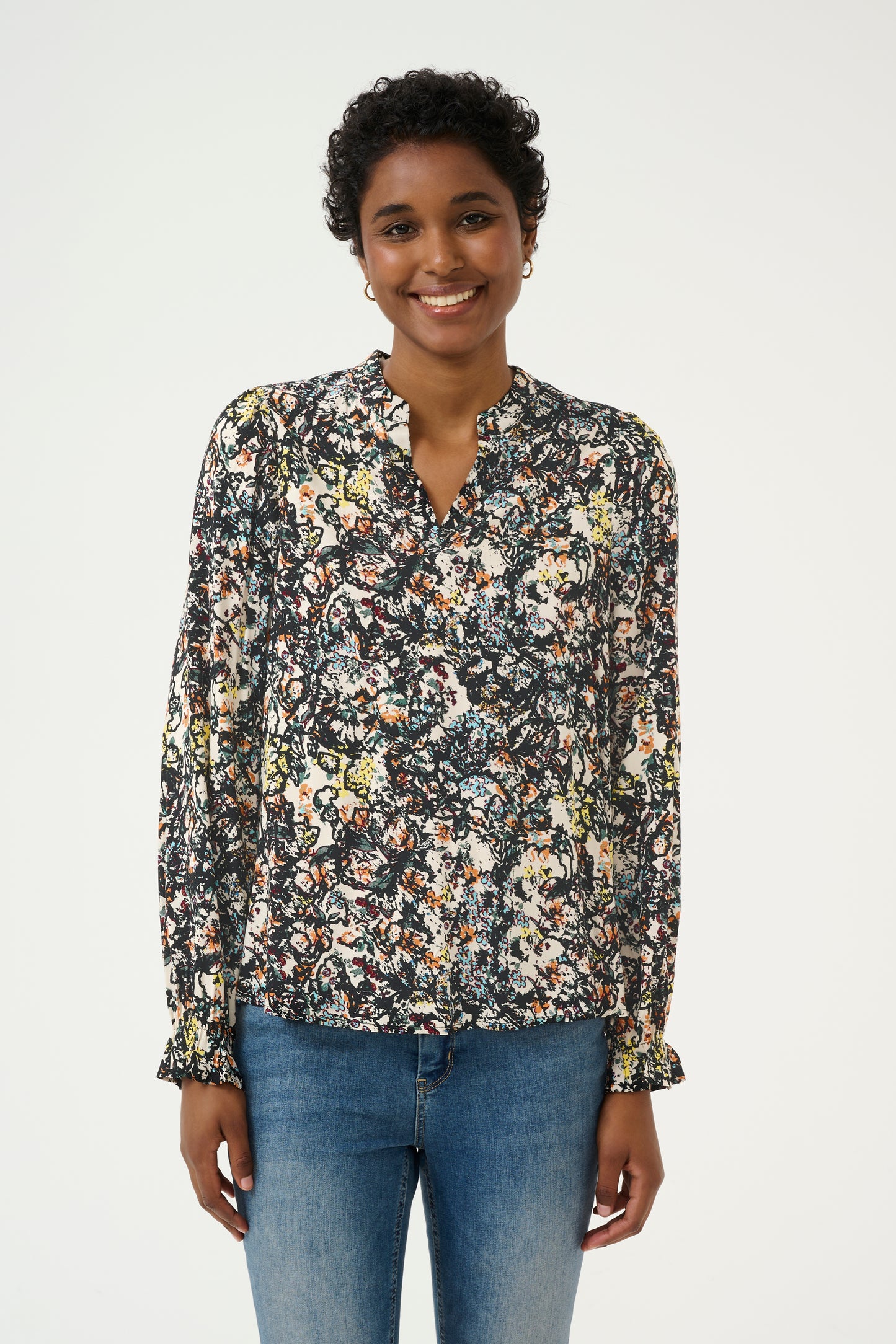 CULTURE SIKA BELLO BLOUSE IN BLACK AND ORANGE FLOWER PRINT
