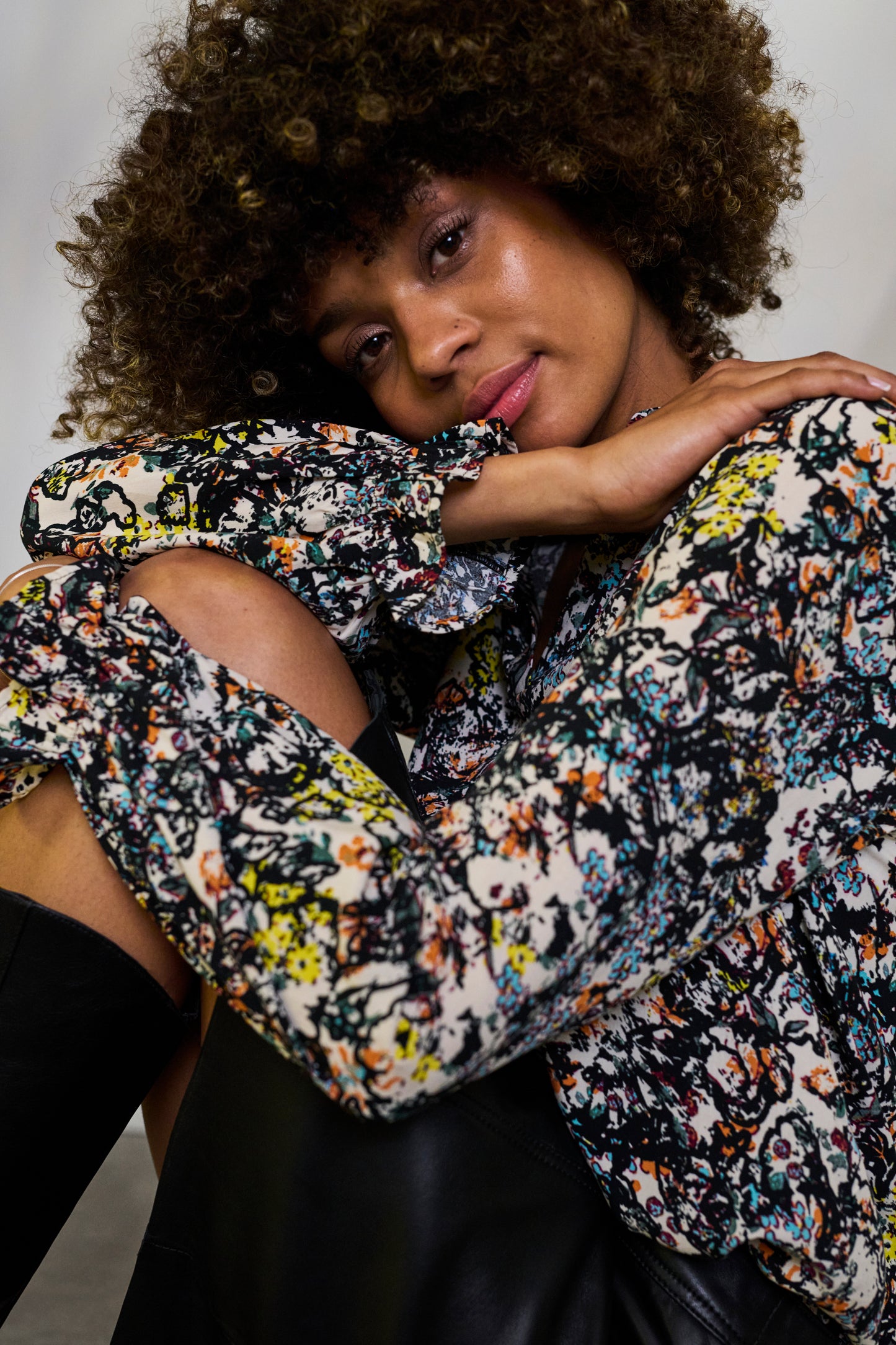 CULTURE SIKA BELLO BLOUSE IN BLACK AND ORANGE FLOWER PRINT