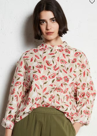 THE KORNER SHORT SLEEVE, COLLARED CREAM BLOUSE WITH RED FLORAL PRINT
