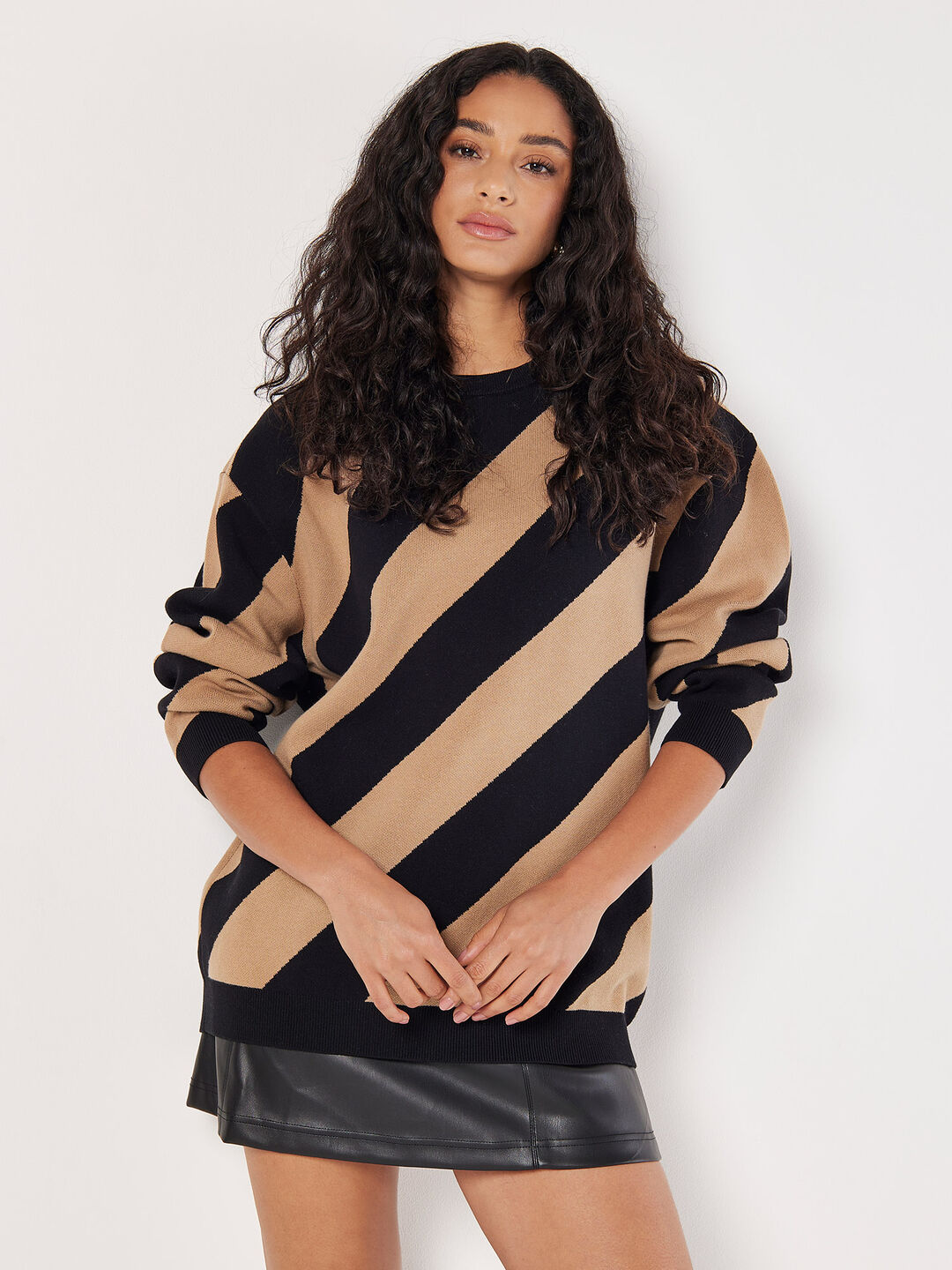 APRICOT DIAGONAL STRIPED OVERSIZED SWEATER IN BLACK AND TAN